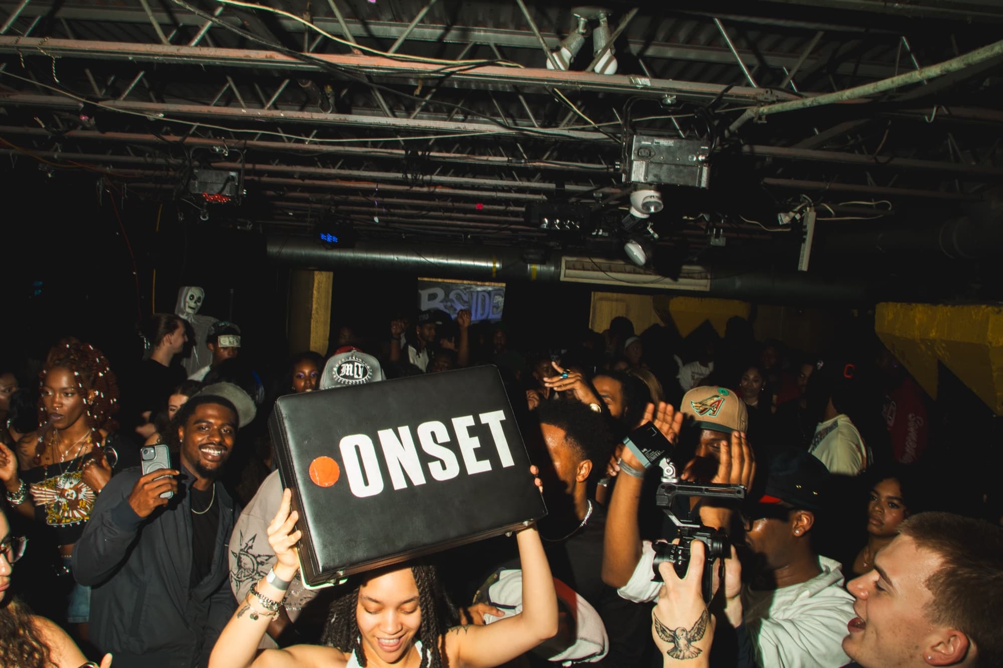 The Summer Nites crowd with the ONSET box held overhead